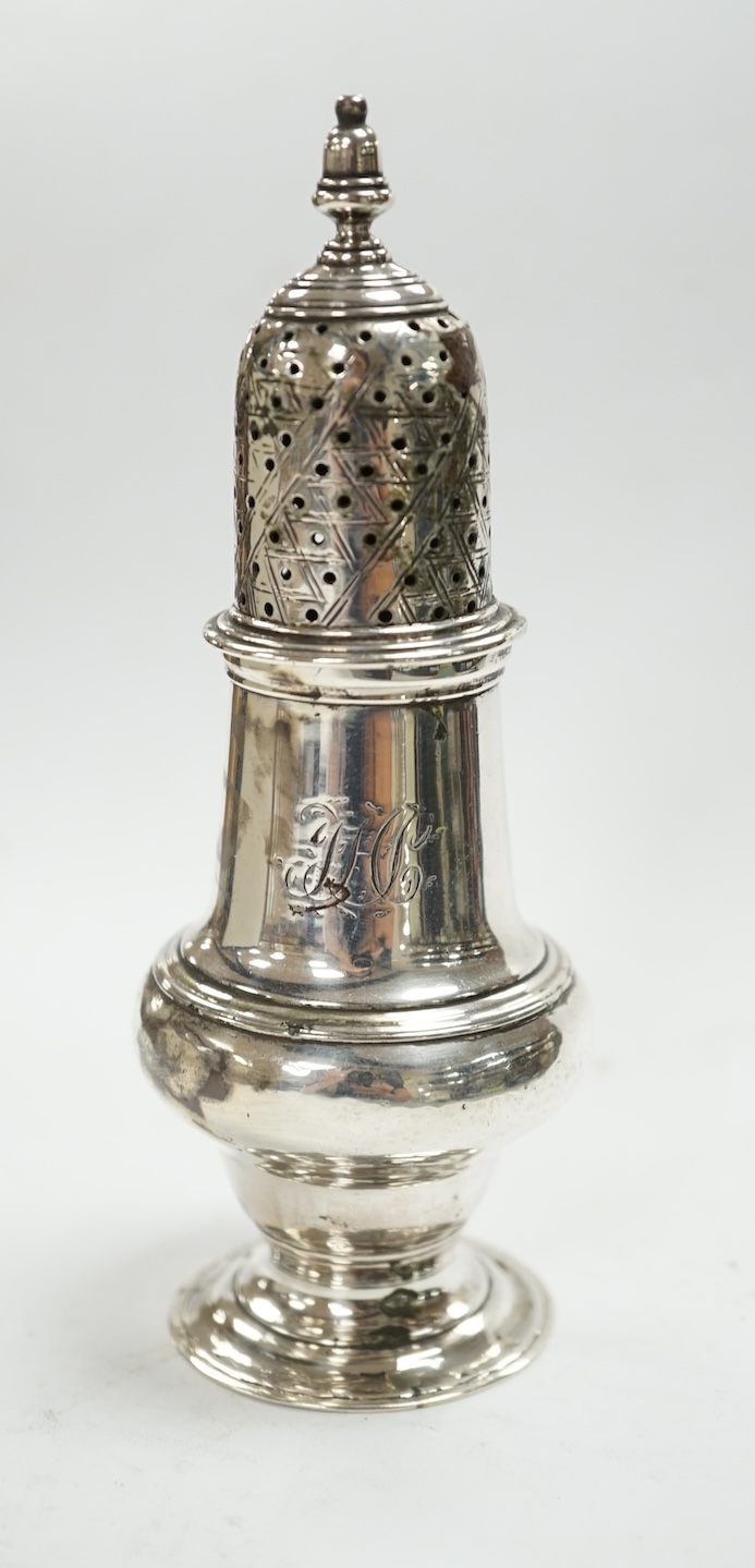 A George III silver baluster pepperette, John Delmester, London, 1763, 14.1cm. Condition - poor to fair